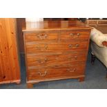 A mahogany chest of two short over three long drawers, with swan neck drop handles, on bracket feet
