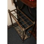 A Victorian metal stick stand, rectangular form with twelve divisions and tray (a/f), 49cm