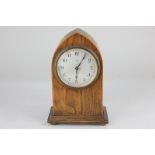 An HAC lancet cased mantle clock, the circular silvered dial with Arabic numerals, 14cm