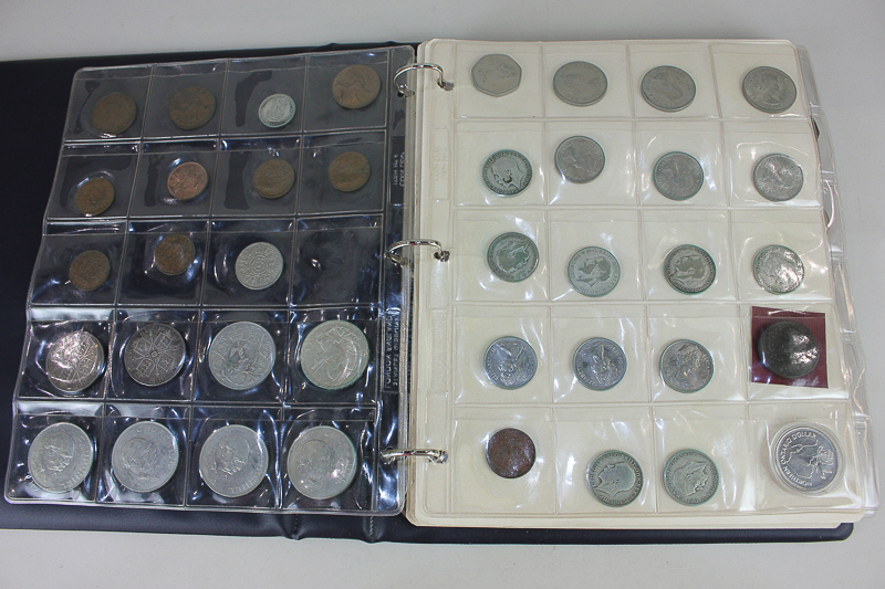 An album of 19th century and later British world coinage including crowns, shillings, florins,