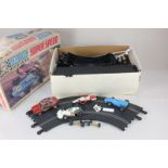 A Scalextric model motor racing super speed set, in original box with four cars (some a/f), track