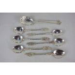 A set of six Indian silver coffee spoons, the terminals in the form of figures, stamped marks to