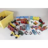 A collection of Corgi, Dinky and similar model vehicles, including a Priestman 'Cub' shovel (in