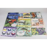 Seventeen Brooke Bond tea card albums, including 'Out into Space' and 'British Wild Life' (not all