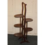 An Edwardian folding oak five tier cake stand, 92cm high