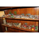 A large collection of Britains and similar die cast figures, including zoo animals, fencing and