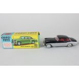 A Corgi Toys Bentley Continental Sports Saloon, 224, with black and silver body and red interior, in