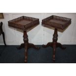 A pair of Chippendale style mahogany lamp tables, with square tops and pierced galleries, on foliate