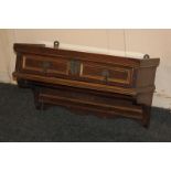 A Continental walnut rectangular wall shelf, glass topped, with drawer and hanging rail below, 52cm