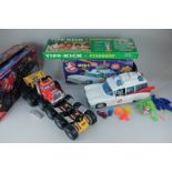 A Kenner Real Ghostbusters Ecto-1 in box (a/f) together with a Tomy Monster Machines Ultimate