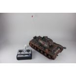 A Heng Long remote control battle tank, 1/16 scale model of a Russian tank with sender radio