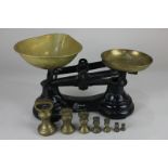 A set of cast iron and brass Librasco scales with a set of weights