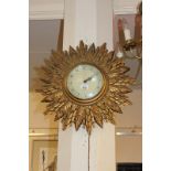 A 20th century Smiths sun burst gilt wall clock, 51cm