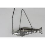 A Chinese silver and metal articulated fish with engraved scales and chain (a/f), 15cm