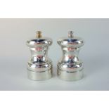 A pair of Elizabeth II salt and pepper mills, makers William Bruford & Son, London 1987, 10cm high