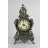 An Ansonia Clock Co American Louis XV style gilt metal mounted mantel clock with enamel dial and