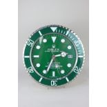 A Rolex advertising wall clock, Oyster Perpetual Date Submariner, in green, 34cm