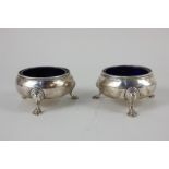 A pair of Victorian silver cauldron salts, makers Richard & Brown, London 1877 and 1878, with blue