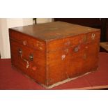 A Victorian oak canteen box, with brass plaque and carry handles, fitted interior of two trays in