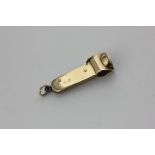 A 9ct gold cigar cutter