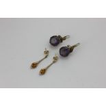 A pair of citrine and diamond drop earrings, and a pair of purple stone drop earrings