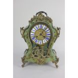 A 19th century gilt metal mounted Louis XV style mantel clock with brass dial and blue and white