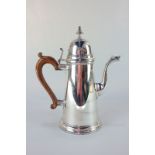 An Elizabeth II silver coffee pot, makers Wakely & Wheeler, London 1967, with tapered cylindrical