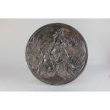 An Elkington and Co silver plated circular wall plaque of a classical scene of tigers attacking a