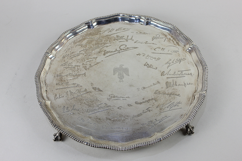 A George V silver salver, makers Goldsmiths & Silversmiths Company, London 1931, of scalloped