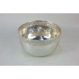 An Eastern 925 silver bowl, circular shape with bird and foliate decorative border, 9.5oz, 16.5cm