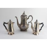 A pair of silver plated cafe au lait pots, together with a silver plated coffee pot with seated