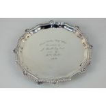 A George V silver salver, makers J B Chatterley & Sons Ltd, London 1930, of scalloped circular