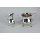 An Edward VII silver cream jug and sugar bowl, maker Jay & Richard Attenborough Co Ltd, Chester,