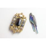 A silver and enamel budgerigar brooch, and a gilt metal and banded agate buckle