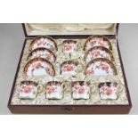 An early 20th century Royal Crown Derby porcelain coffee set for six, in the Imari pattern No