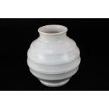 A Keith Murray Wedgwood Moonstone vase, globular ribbed form in white matte glaze (some erasing),