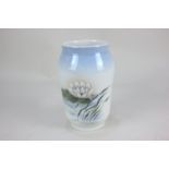 A Royal Copenhagen porcelain vase depicting a water lily, 17cm