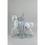 A large Lladro porcelain figure of a woman on horseback, 44cm high