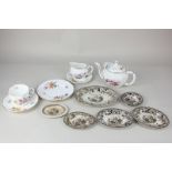 A Royal Crown Derby porcelain 'Derby Roses' bachelor's part tea set with floral decoration on