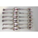 A set of twelve George III silver kings double shell and laurel pattern dessert spoons, maker Paul