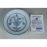 A Chinese blue and white porcelain shallow dish decorated with a peony, 20.5cm, believed to be