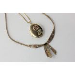 A 9ct gold fringe necklace, and a 9ct gold and garnet locket on a box link neck chain, 28g gross