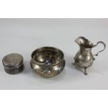 An Edward VII silver sugar bowl, makers Roberts & Belk, Sheffield 1903, a silver cream jug, and a