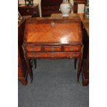 A 19th century French gilt metal mounted bureau de dame inlaid writing desk with quarter veneered