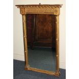 A Regency giltwood and gesso pier glass with inverted ball frieze over rectangular mirror plate,