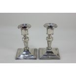 A pair of Victorian silver dwarf column candlesticks, makers Harrison Brothers & Howson, Sheffield