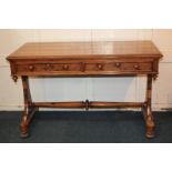 A Victorian olive wood library table c.1850, with rectangular moulded edge top above two drawers, on