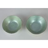 A pair of silver and pale green enamel bowls by Grete Prytz Kittelsen for Jacob Tostrup, with