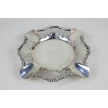 An Edward VII silver ashtray with pierced floral scrolling design, makers Thomas Latham & Ernest