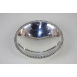 A Norwegian 830 silver bowl by David Andersen, with embossed leaf design border, 14cm diameter 3oz